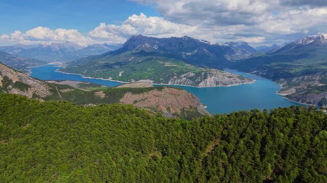 Aerial view of Serre-Poncon lake with Grand Morgon peak. Durance Valley in summer. Hautes-Alpes (French Alps), France