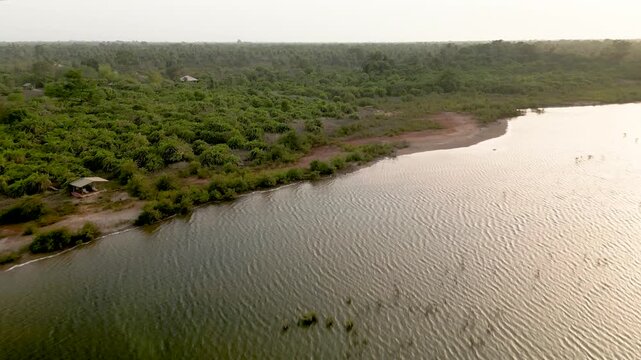 aerial landscape view of Casamance river delta Senegal in Africa with wetlands and marsh and mangroves forest, pristine environment