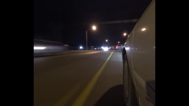 Dimly lit road at night