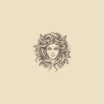 Hand drawn vintage engraving illustration of a beautiful woman face framed by wavy hair and leaves.