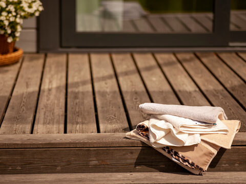 fresh bath cotton towels on the steps