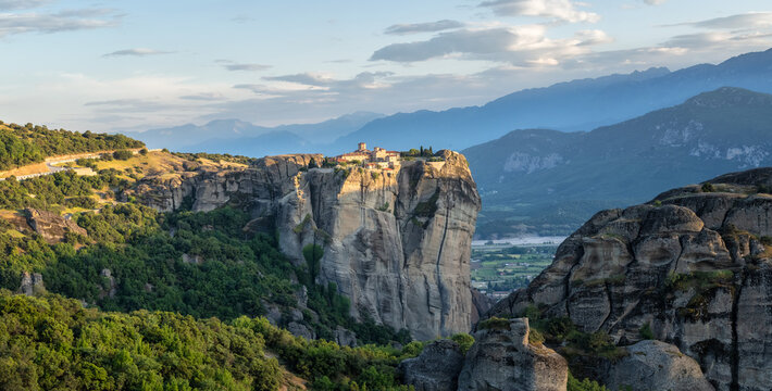 Amazing panoramic view with the majestic Holly Trinity Monastery in the Meteora Valley near Kastraki, Greece