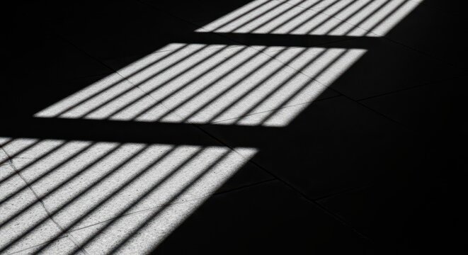 Dramatic Black and White Staircase Shadows and Light Patterns on a Textured Surface