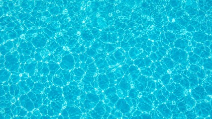 Fototapeta premium A top-down aerial photograph of a crystal-clear swimming pool surface featuring gentle ripples and shimmering caustic light patterns.