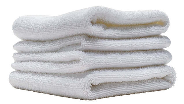 Stack of fluffy white terry cloth towels