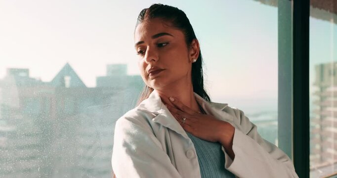 Woman, doctor and thinking by window with grief, fatigue or mistake in hospital. Mental health, sad physician and medical person with healthcare, anxiety and stress for loss or surgery fail in clinic