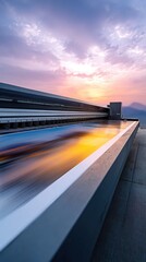 Obraz premium Large format industrial printer outputting landscape photography during a dramatic sunset