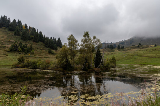 Lac de Joux Plane under a cloudy sky in the French Alps, Haute-Savoie