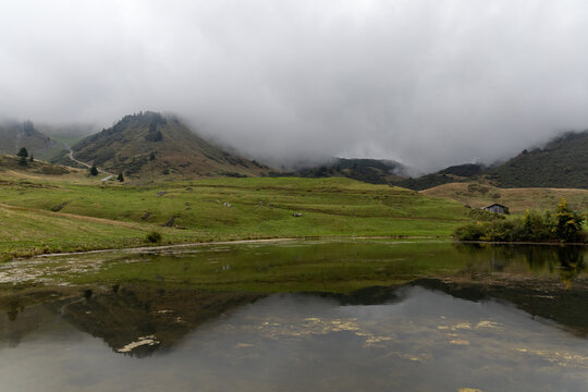 Lac de Joux Plane under a cloudy sky in the French Alps, Haute-Savoie