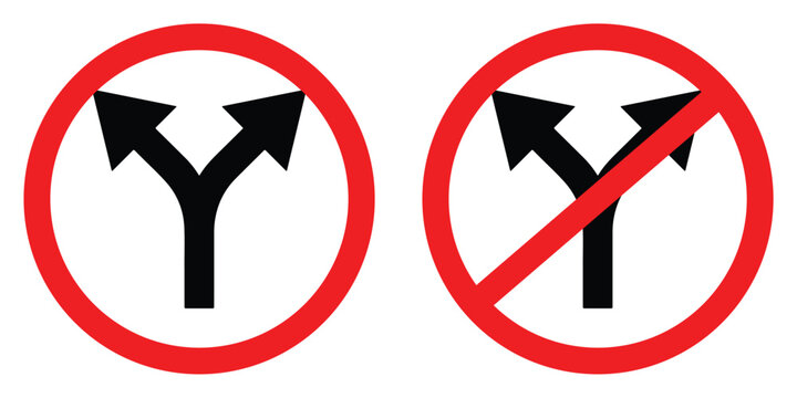 Two road signs indicating a choice between diverging paths and a prohibited split direction