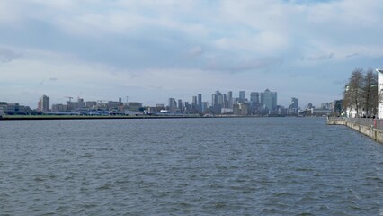 Fototapeta premium Canary Wharf Skyline Across River With London Waterfront and Modern Office Skyscrapers