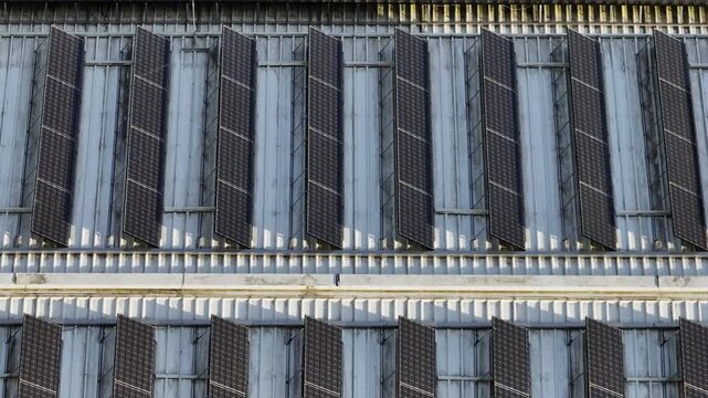 Solar panels installed on a building roof convert sunlight into clean energy. This site plays a role in renewable energy initiatives.