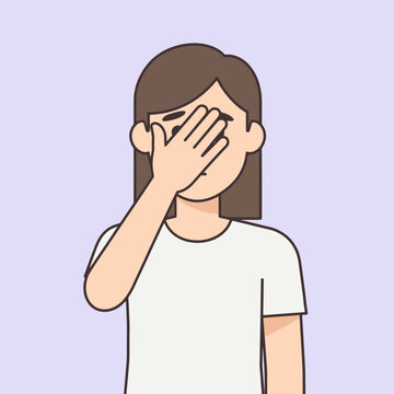 A person covers their face with their hand, expressing a feeling of shame