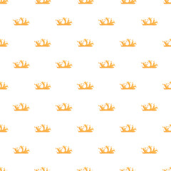 Fototapeta premium Orange liquid splashes creating a bright seamless pattern on a white background
