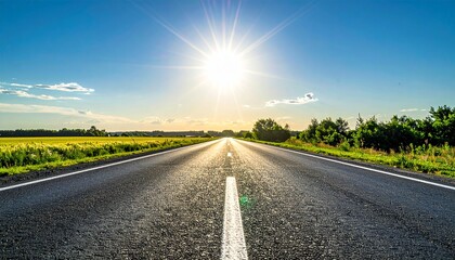 Fototapeta premium アスファルトの道路と炎天下の青空が広がる夏の風景