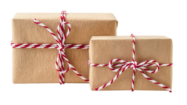 Two brown paper gift boxes tied with red and white twine