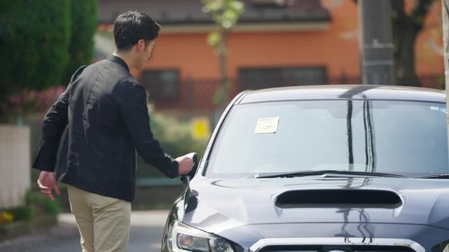 駐禁を切られた車とオーナー