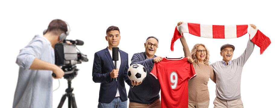 Sports reporter interviewing senior football fans in front of a camera
