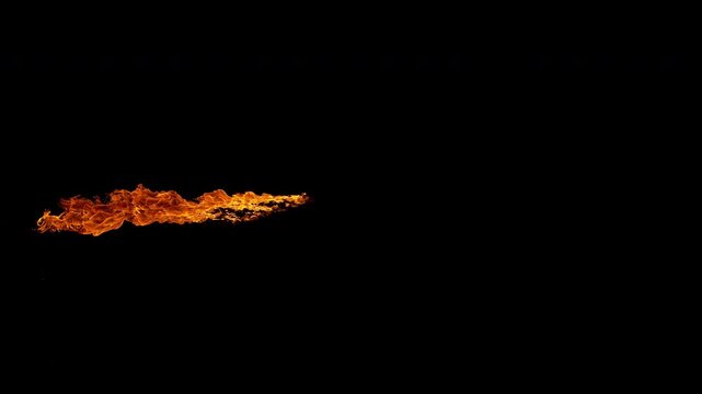 Super slow motion capture of a flickering fire flame isolated on a black background. High-speed footage reveals intricate combustion patterns, fluid motion, and glowing details.