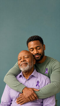 Vertical portrait of an African American father and son embracing. Two Black men wearing purple ribbons for health awareness. Alzheimer's or cancer support concept. Copy space for text
