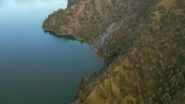 Deep Blue Lake Segara Anak Mountains And Trees Rinjani National Park Lombok Indonesia 4K 60FPS