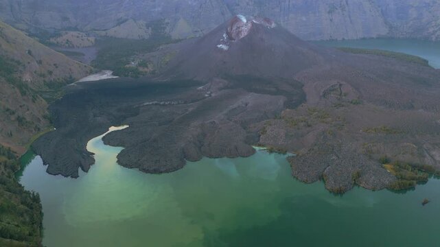 Lake Segara Anak And Rinjani Volcanic Cone Lombok Indonesia Drone Track Back High Angle 4K 60FPS