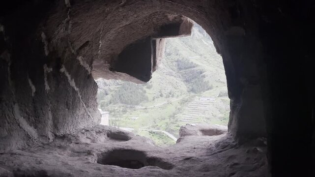 Georgia POV from Inside Ancient Vardzia Cave Monastery Looking Out Over Green Mountain Landscape