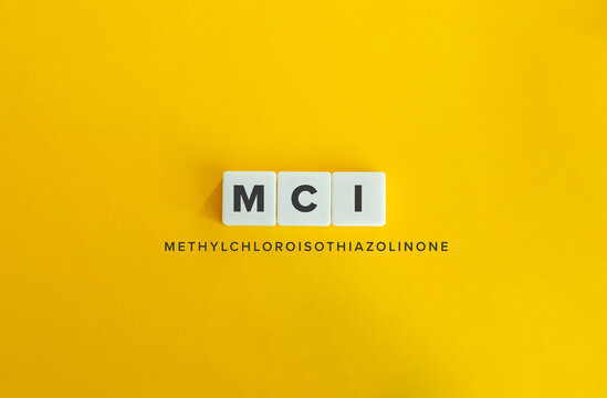 MCI Methylchloroisothiazolinone Acronym on White Tiles Over Bright Yellow Background