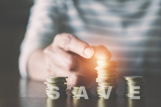 Senior woman hand add more coin on stack of coins with save word for insurance, fund, SSF, LTF, RTF, savings, retirement, pension concept