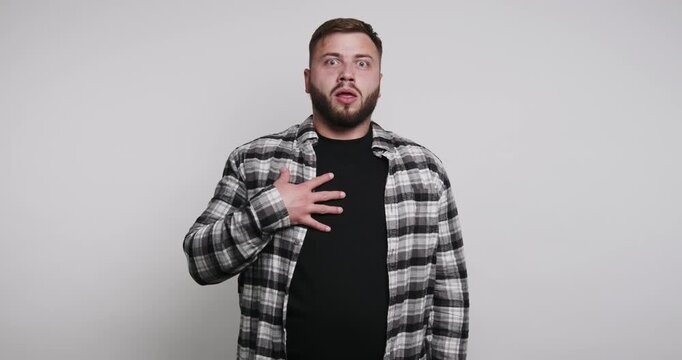 Man expresses surprise and realization in four expressive frames captured indoors