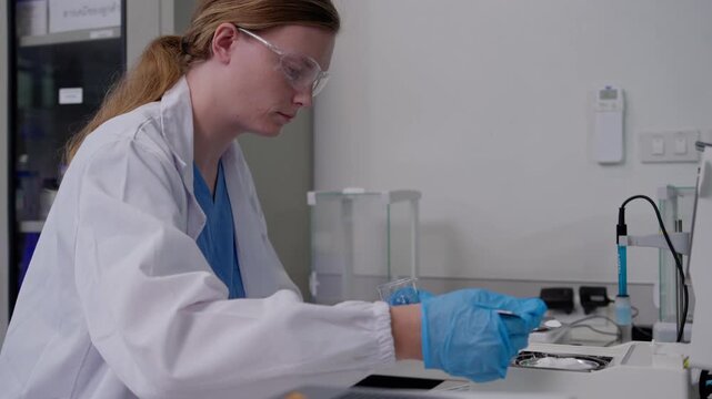 Laboratory experiment involving precision techniques research facility scientific procedure controlled environment close-up view innovation
