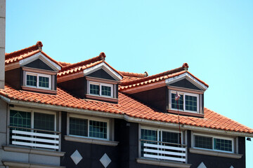 Obraz premium Elegant Residential Architecture with Mediterranean Style and Dormer Windows