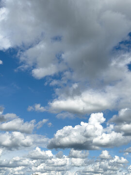 blue sky with scattered  clouds