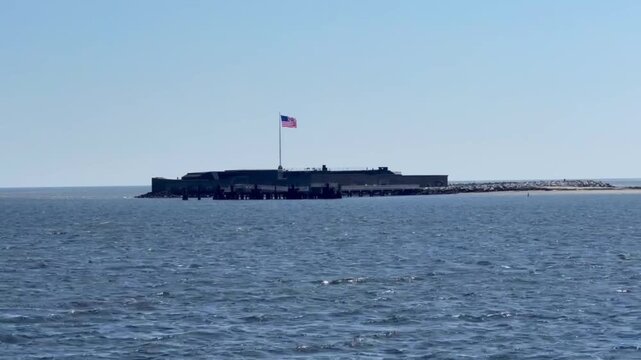 Handheld telephoto shot of historic Fort Sumter from a moving ferry boat in Charleston Harbor, South Carolina. 4K at 30 FPS