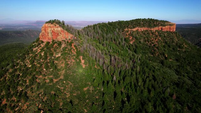 Slow aerial drone circling of Bears Ears butte in Bears Ears National Monument, Utah.