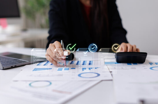 Business professional performing quality control and compliance audit on financial data, checking project tasks, reviewing company standards, and verifying analytics reports