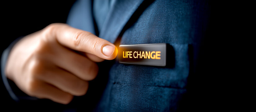 Businessman Pointing to Glowing Life Change Button on Navy Blue Suit Jacket