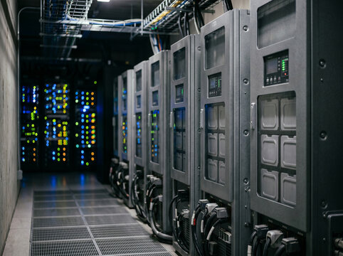Data center corridor with rack mounted battery systems