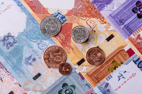 Qatar paper money, the Qatari riyal as a tool for financial transactions and trade. Qatari money
