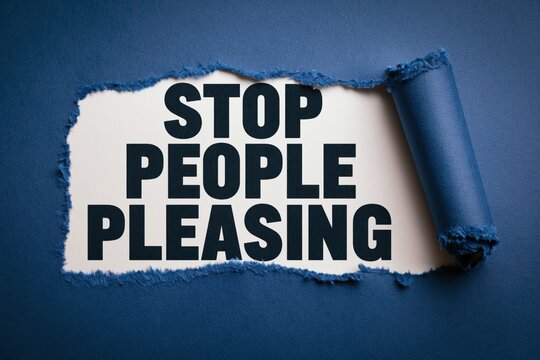 The words stop people pleasing revealed under torn paper