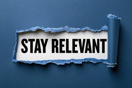 Text stay relevant appearing behind torn dark blue paper background