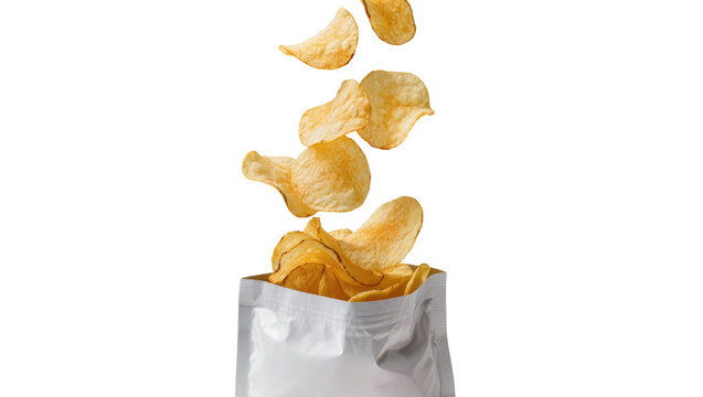 Crispy potato chips falling out of a silver bag