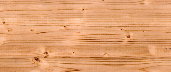 Fototapeta premium Wood texture background with natural grain patterns and knots on a light pine timber surface