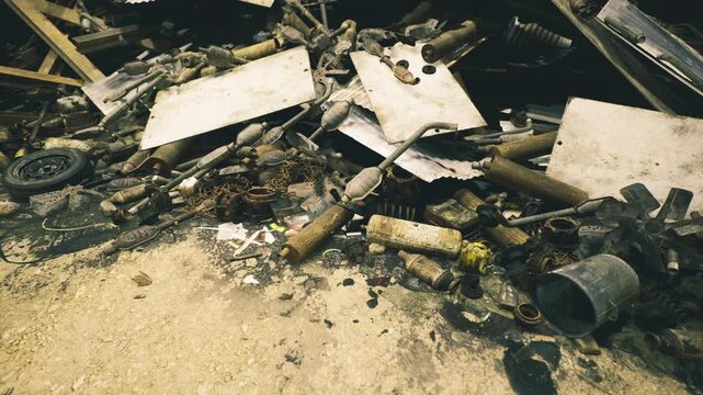 Bright heap of recoverable scrap materials with rusted metal sheets and tire fragments, wooden scraps and scattered debris hinting at reuse potential, textured