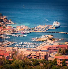 Colorful summer cityscape of Palau port, Province of Olbia-Tempio, Italy, Europe. Sunny afternoon scene of Sardinia island. Wonderful mediterranean seascape. Traveling concept background. © Andrew Mayovskyy