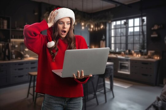 Young woman in Santa hat using laptop in kitchen with shocked expression, AI generated image