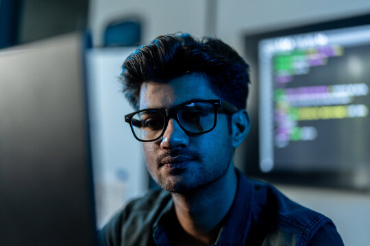 Close Up Portrait Of Male Software Developer With Glasses
