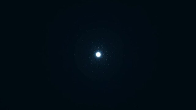 Abstract particle explosion of glowing light on dark background.