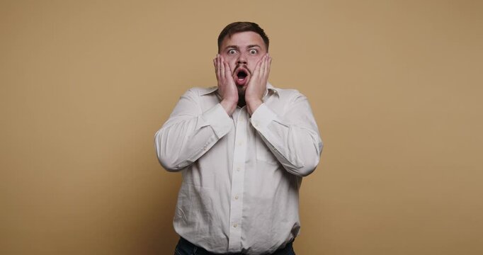 Man expresses different emotions in a studio setting with a yellow backdrop in a short series of images