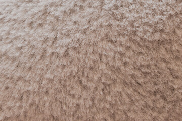 Macro shot of plaid blanket texture with soft wool fibers, close up of woven fabric material for cozy home interior, warm textile surface and craft pattern background © moryachka